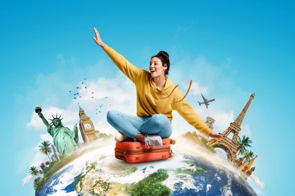 Tourist sitting on globe - Travel category