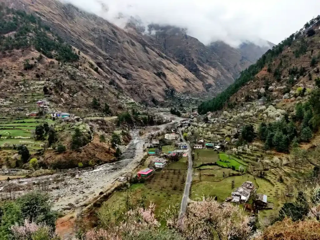 Tirthan Valley riverside views in Himachal Pradesh, one of the less crowded places to visit in India in June
