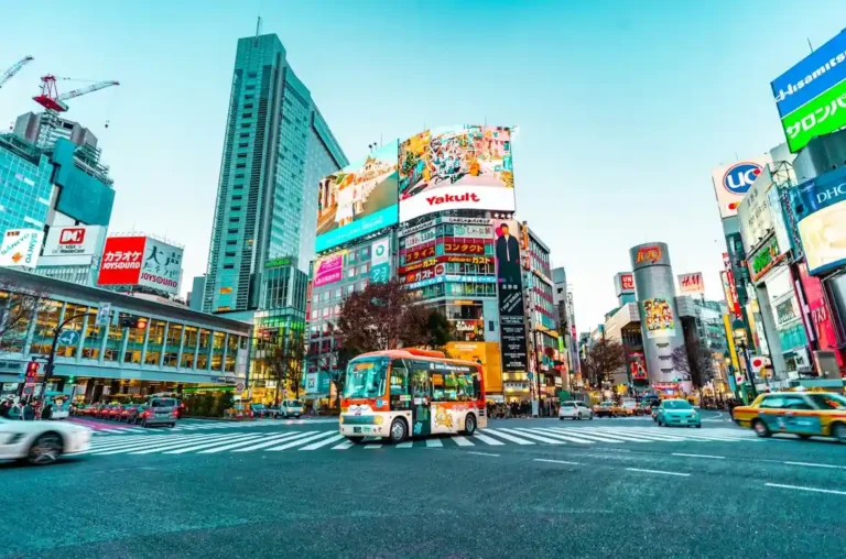 Tokyo travel guide showing city streets, famous landmarks, food, shopping, and first-time trip planning.